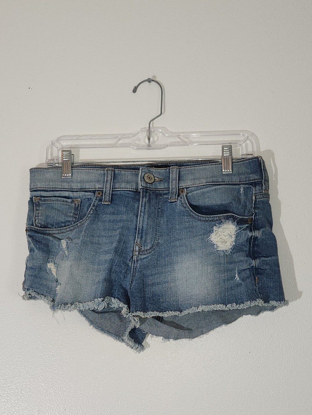 Express Women's Distressed Denim Shorts in Medium Blue